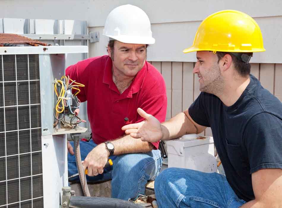 Reliable AC Repair in Denton, TX Image of an air conditioning technician at work, featuring Comfort Conditioning and highlighting reliable AC repair services in Denton, TX.