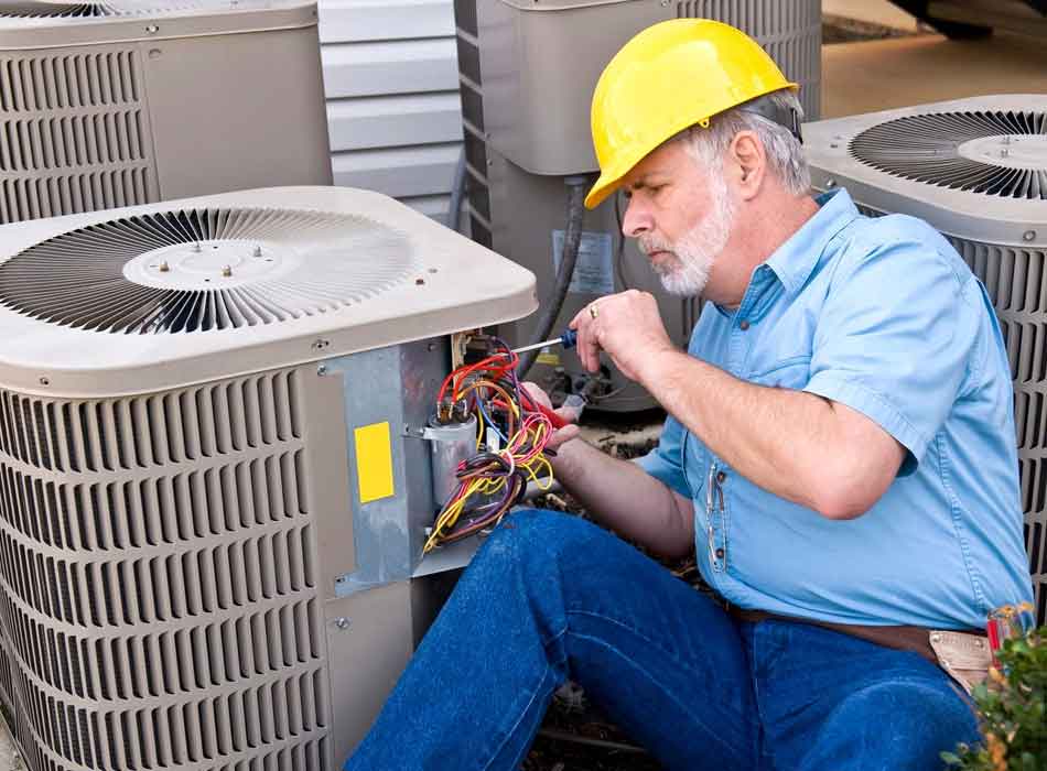 Reliable AC Repair in Krum, TX Image of an aircon technician at work, featuring Comfort Conditioning and highlighting reliable AC repair services in Krum, TX.