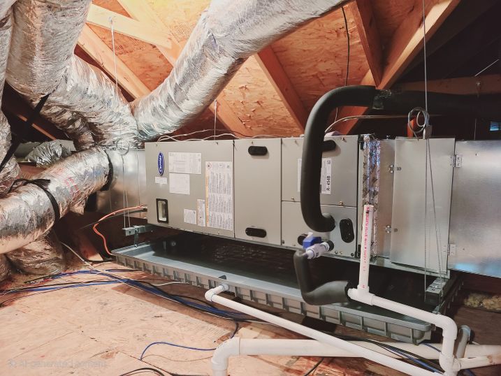 Image of an air conditioning unit, featuring Comfort Conditioning and highlighting AC installation with concrete pads and wired setup for stable and secure operation.