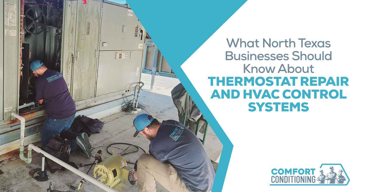 Two HVAC technicians working on commercial heating and cooling equipment during a service visit